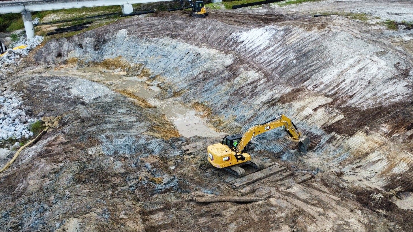 excavating bypass trench
