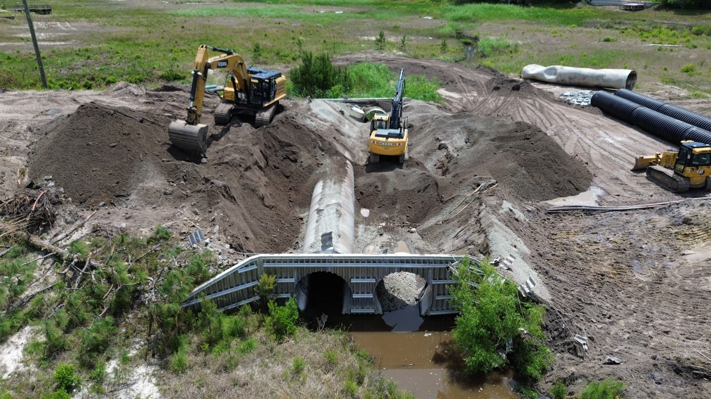 Excavating North Lake Dam Cross Pipe